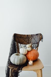 Kaboompics - Halloween Pumpkins on Spiderweb Covered Chair