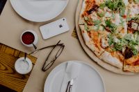 Kaboompics - Close-Up of Fresh Pizza with Arugula and Melted Cheese