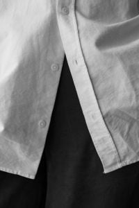 Kaboompics - Minimalist White Shirt and Black Trousers Fashion Portrait