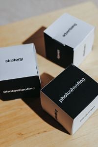 Kaboompics - Little paper boxes with words on them