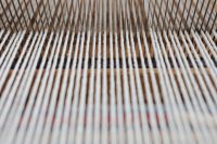 Kaboompics - Wooden Loom Detail with White Warp Threads
