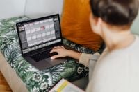 Kaboompics - A woman who works with a laptop computer at home