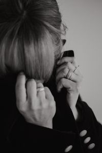 Kaboompics - Black and White Woman Adjusting Blazer Collar