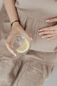 Kaboompics - Top View of Lemon Water and Pregnant Belly