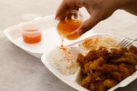 Kaboompics - Adding Sauce To Rice Bowl