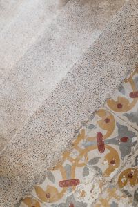Kaboompics - Speckled Terrazzo Surface with Colorful Tile Corner Detail