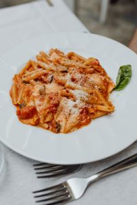 Kaboompics - Tomato Pasta with Parmesan, Basil and White Plate