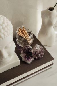 Kaboompics - White Buddha Bust And Crystal Cluster Still Life