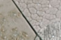 Kaboompics - Soft-Focus Diagonal Glass Seam against a Faceted Pattern
