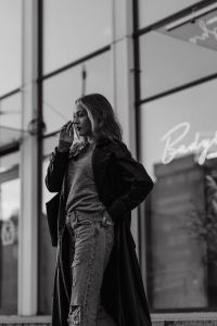Kaboompics - Black and White Street Style Portrait Outside a Modern Glass Building