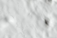 Kaboompics - White Plaster Surface with Fine Scratches and Subtle Raised Texture, Neutral Background