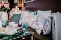 Kaboompics - Blue Accent Pillows and Coffee Table Styling in a Modern Living Room, Wide View