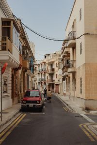 Kaboompics - Narrow Malta Street with Parked Cars