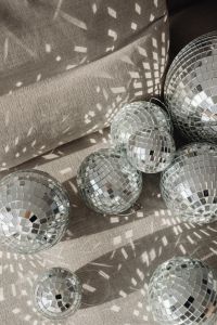 Kaboompics - Macro Detail of Mirror Ball Tiles on a Gray Sofa