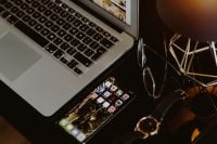 Kaboompics - Top View Laptop and Smartphone Desk Setup with Gold Accessories