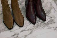 Kaboompics - Tan Suede and Burgundy Leather Boots for Fall Fashion Styling