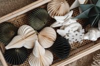 Kaboompics - Handmade Paper Ornaments in Wooden Tray