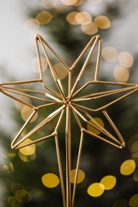 Kaboompics - Close-Up Gold Star Ornament with Christmas Light Bokeh