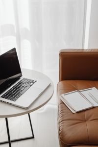 Kaboompics - Vertical Home Office Flat Lay with Open Laptop, Calendar Planner and Glass of Water