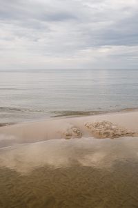 Kaboompics - Small Waves Meeting a Sandy Shore