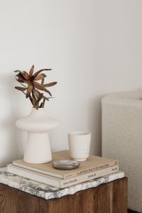 Kaboompics - Neutral Interior Styling with Dried Flower Vase, Ceramic Cup and Armchair Copy Space