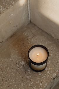 Kaboompics - Black Candle Viewed From Above on Concrete