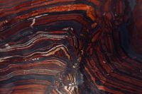 Kaboompics - Horizontal Rust Red and Black Marble Bands, Abstract Natural Stone Texture from Naples Italy