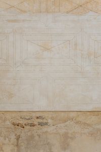 Kaboompics - Carved Geometric Stone Wall Detail