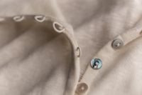 Kaboompics - Beige Knitwear With Button and Loop Fastening