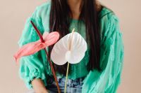 Kaboompics - A Beautiful Young Mixed Race Girl with Anthurium Flower