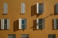 Kaboompics - Orange Facade with Blue Shutters in Malaga