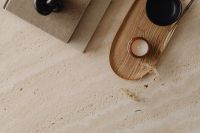Kaboompics - Travertine coffee table and greige linen couch