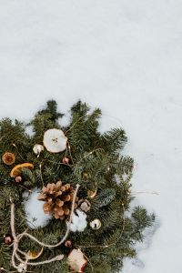 Kaboompics - Christmas Wreath With Pine Cones and Frosted White Accents
