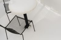 Kaboompics - Snow-Covered Black Wire Patio Chairs and Round Table