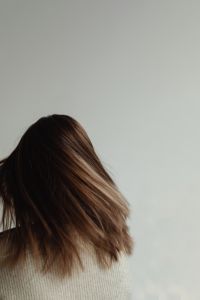 Kaboompics - Woman Turning Her Head to Show Shoulder-Length Brown Hair