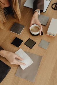 Kaboompics - Overhead View of Coffee Beside Material Samples