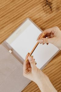 Kaboompics - Overhead Handwriting in a Blank Journal