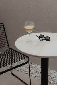 Kaboompics - Rainy Day Wine Break on Marble Bistro Table