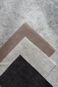 Kaboompics - Angled Neutral Textile Swatches on Gray Stone