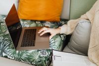 Kaboompics - A woman who works with a laptop computer at home