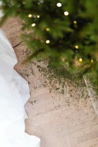 Kaboompics - Small Wrapped Gift with Blurred Christmas Tree Lights