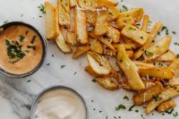 Kaboompics - Crispy Fries with Dipping Sauce Overhead