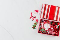 Kaboompics - Santa Decoration and Open Christmas Gift Box Flat Lay