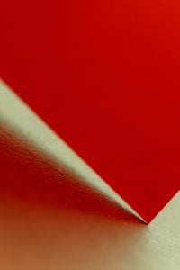Kaboompics - Red Folded Paper Abstract Background With Sharp Geometric Shape