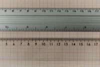 Kaboompics - Metric Ruler Scale on Orange Grid Background