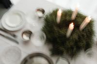 Kaboompics - Wide Christmas Dinner Table with Advent Wreath, Silver Pitcher and Wrapped Gift
