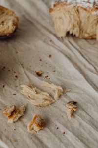 Kaboompics - Close-Up Bread Crumbs on Wrinkled Linen
