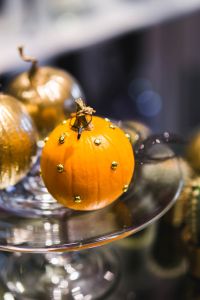 Kaboompics - Golden ornamental pumpkins with cactuses
