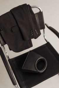 Kaboompics - Black Blazer and Handbag on Chrome Chair