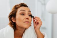 Kaboompics - Close-Up of a Middle-Aged Woman Applying Mascara to Her Eyelashes